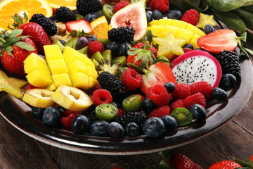 salad with fresh fruits and berries. healthy spring fruit salad  with strawberries
