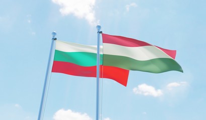 Fototapeta na wymiar Hungary and Bulgaria, two flags waving against blue sky. 3d image