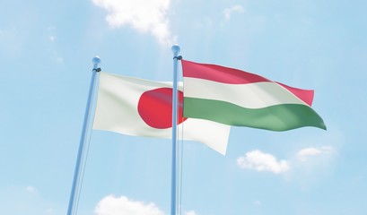Hungary and Japan, two flags waving against blue sky. 3d image