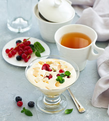 Zabaglione with champagne and berries. French dessert.