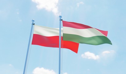 Hungary and Poland, two flags waving against blue sky. 3d image