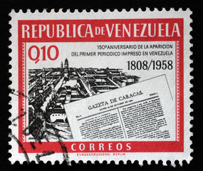 Stamp printed in Venezuela shows Gazeta de Caracas newspapers, circa 1960.
