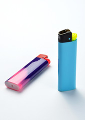 Multi colored lighters on white