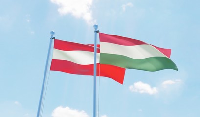 Fototapeta na wymiar Hungary and Austria, two flags waving against blue sky. 3d image
