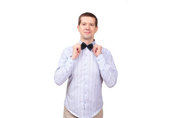 The man in a light shirt and with a bow butterfly