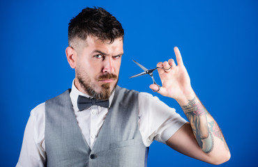 perfect beard. Male fashion. unshaven barber in bow tie. Bearded mature hipster hold shaving blade....