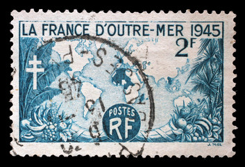 Stamp printed in France shows Overseas France Map, circa 1945.