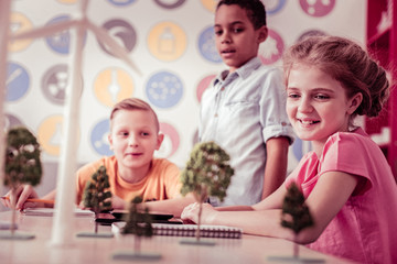 Interested students looking on the wind farm