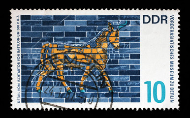Stamp issued in Germany - Democratic Republic (DDR) shows Bull of the Ishtar Gate,  Babylon, Near...