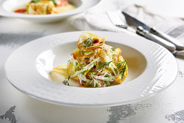 Salad with Crispy Potato Chips and Chopped Strips Vegetables