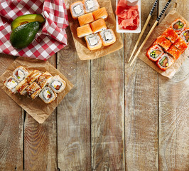 Fototapeta na wymiar Various Sushi Set Background, Frame or Mockup Top View