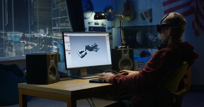 Man designing hinge on a computer