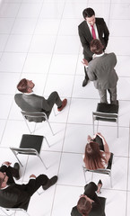 Business people at a conference, top view