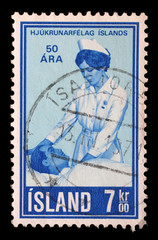Stamp issued in Iceland shows Nursing for the sick, 50th Anniversary of Icelandic Nurses Association, circa 1970.