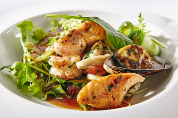 Warm Seafood Salad with Vegetables, Green Leaf Mix and Spicy Dressing