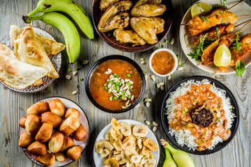 West african food concept. Traditional Wset African dishes assortment - peanut soup, jollof rice,...
