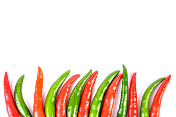 Close-up of some red and green chillies mixed isolated