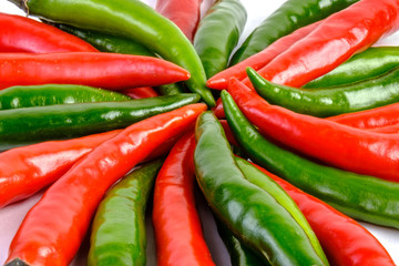 Close-up of some red and green chillies mixed