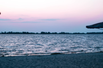 beautiful view of sandy beach at sunrise
