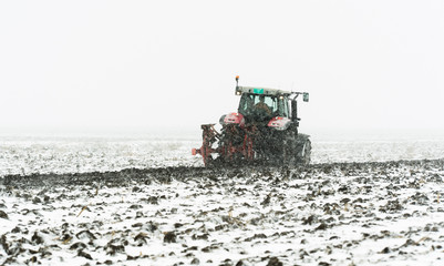 Plowing of stubble field during winter season