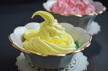 yellow dessert in a cream bowl