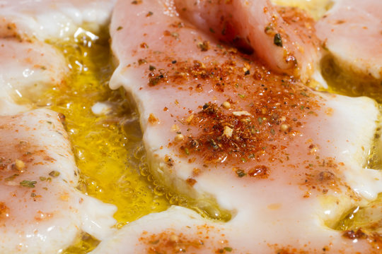 Spiced cutlets frying