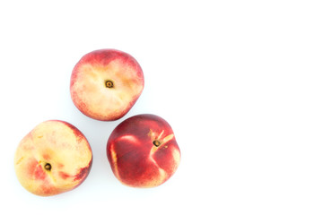 Heap of ripe raw beautiful colorful red yellow nectarines isolated with shadow on white background. Summer fruits vitamins harvest healthy lifestyle concept. Food poster with copy space. Horizontal
