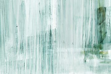 Dripping paint on glass surface, grungy background or texture