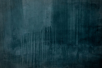 Dark blue grungy distressed canvas bacground