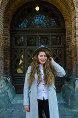 Young smiling girl with curly hair