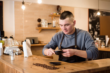 Barista making cappuccino, bartender preparing coffee drink