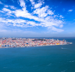 Summertime sunshine day panoramic cityscape view of Lisbon, Tagus river, Portugal.