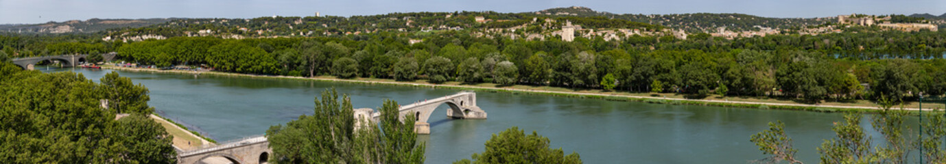 Fototapeta na wymiar Panoramic view of Fort Saint-Andre in Avignon, France, withthe famous Avignon bridge in the foreground