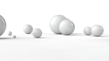3D illustration of balls of different sizes on a white surface. The idea of order, chaos and abstraction. Comparative image of the geometry of space. 3D rendering isolated on white background.