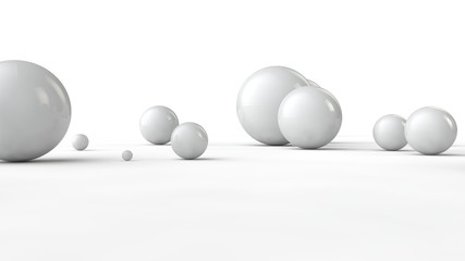 3D illustration of balls of different sizes on a white surface. The idea of order, chaos and abstraction. Comparative image of the geometry of space. 3D rendering isolated on white background.