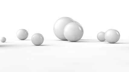 3D illustration of balls of different sizes on a white surface. The idea of order, chaos and abstraction. Comparative image of the geometry of space. 3D rendering isolated on white background.