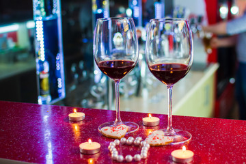 two glasses of wine and heart-shaped cookies. Valentine's Day