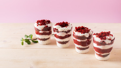 Homemade cake dessert. Trifle on pink background