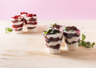 Homemade cake dessert. Trifle on pink background