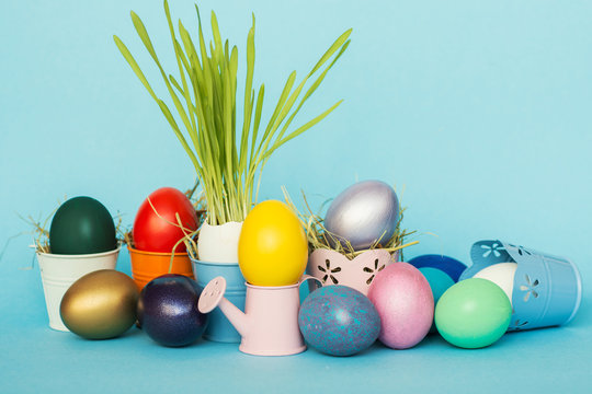 Easter eggs  in colored watering can, selective focus image, Card Happy Easter