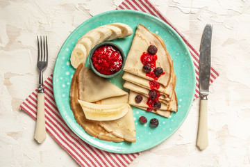 French style crepes with banana, Berries. Top view. Flat lay. space for text