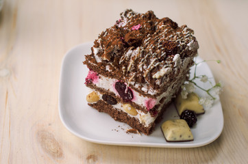 Still life on the table. Sweet cake and a hot drink .
