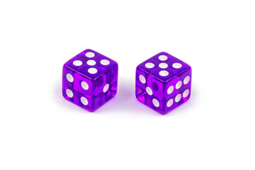 Two purple glass dice isolated on white background. Five and five.