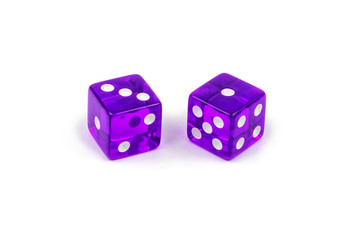 Two purple glass dice isolated on white background. Three and one.