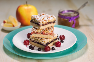 Still life on the table. Sweet cake and a hot drink .