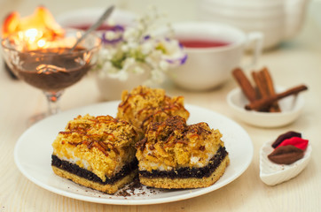 Still life on the table. Sweet cake and a hot drink .