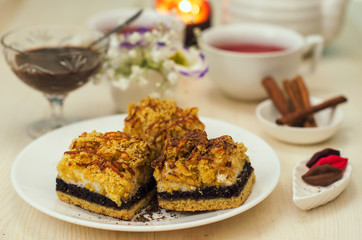 Still life on the table. Sweet cake and a hot drink .
