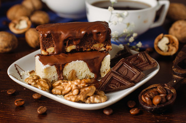 Still life on the table. Sweet cake and a hot drink .