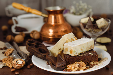 Still life on the table. Sweet cake and a hot drink .