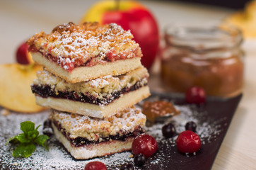 Still life on the table. Sweet cake and a hot drink .